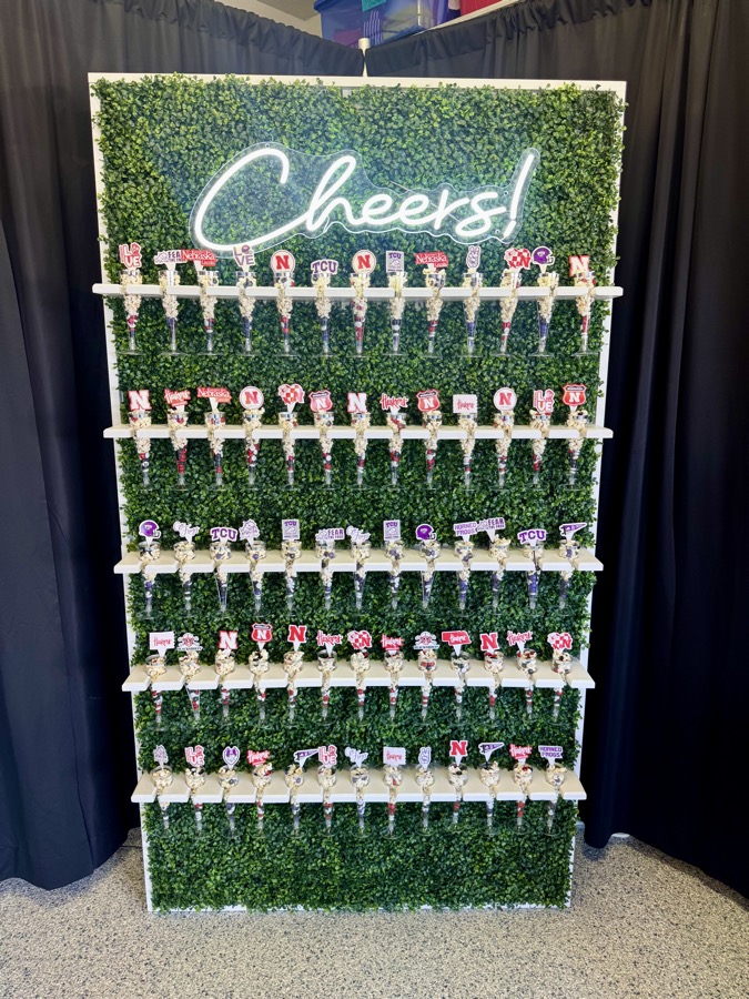 Platinum Pours at the Best of Omaha awards event with the branded backdrop and Allie in attendance